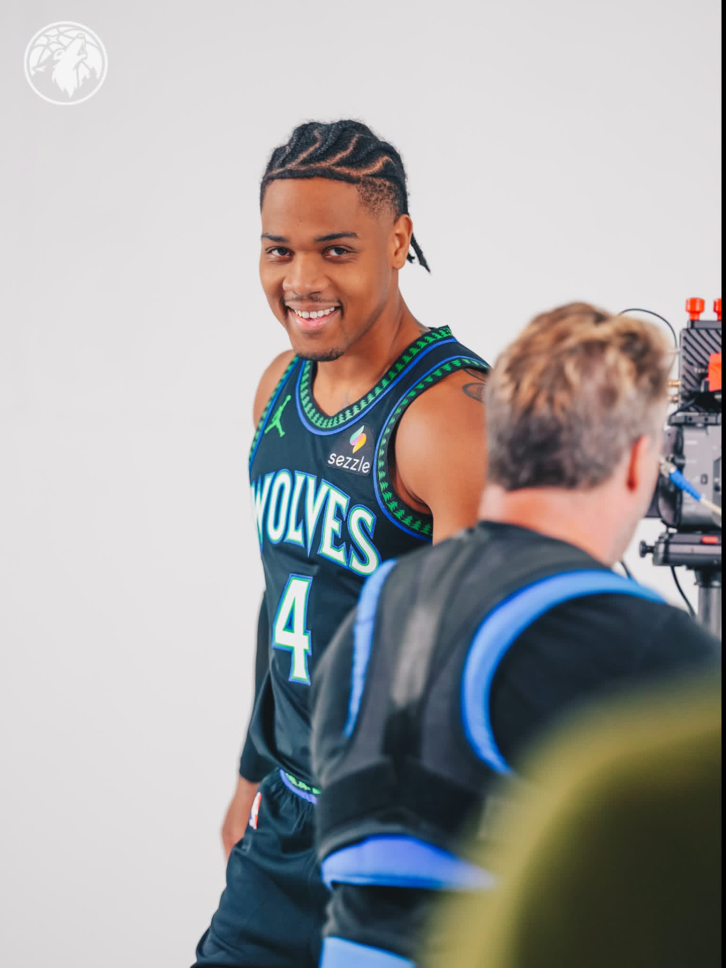 Wolves #4 smiling at the camera in the black city edition jersey on media day